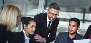 Lawyers discussing a dispute resolution and litigation matter in a lawyer's office.